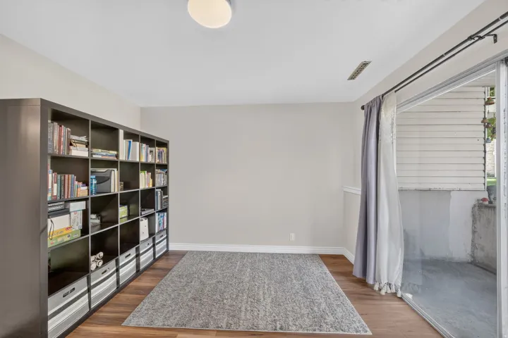 Wood-finish flooring with a neutral wall color