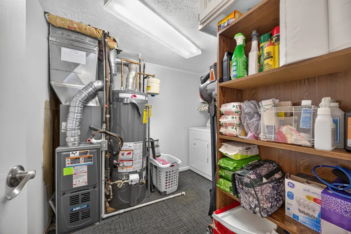 In home laundry, mechanical room and storage.