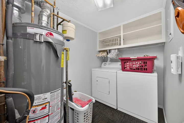 Spacious bathroom with walk-in tub. tub has shower wand, and tile surround and can be used as a shower.