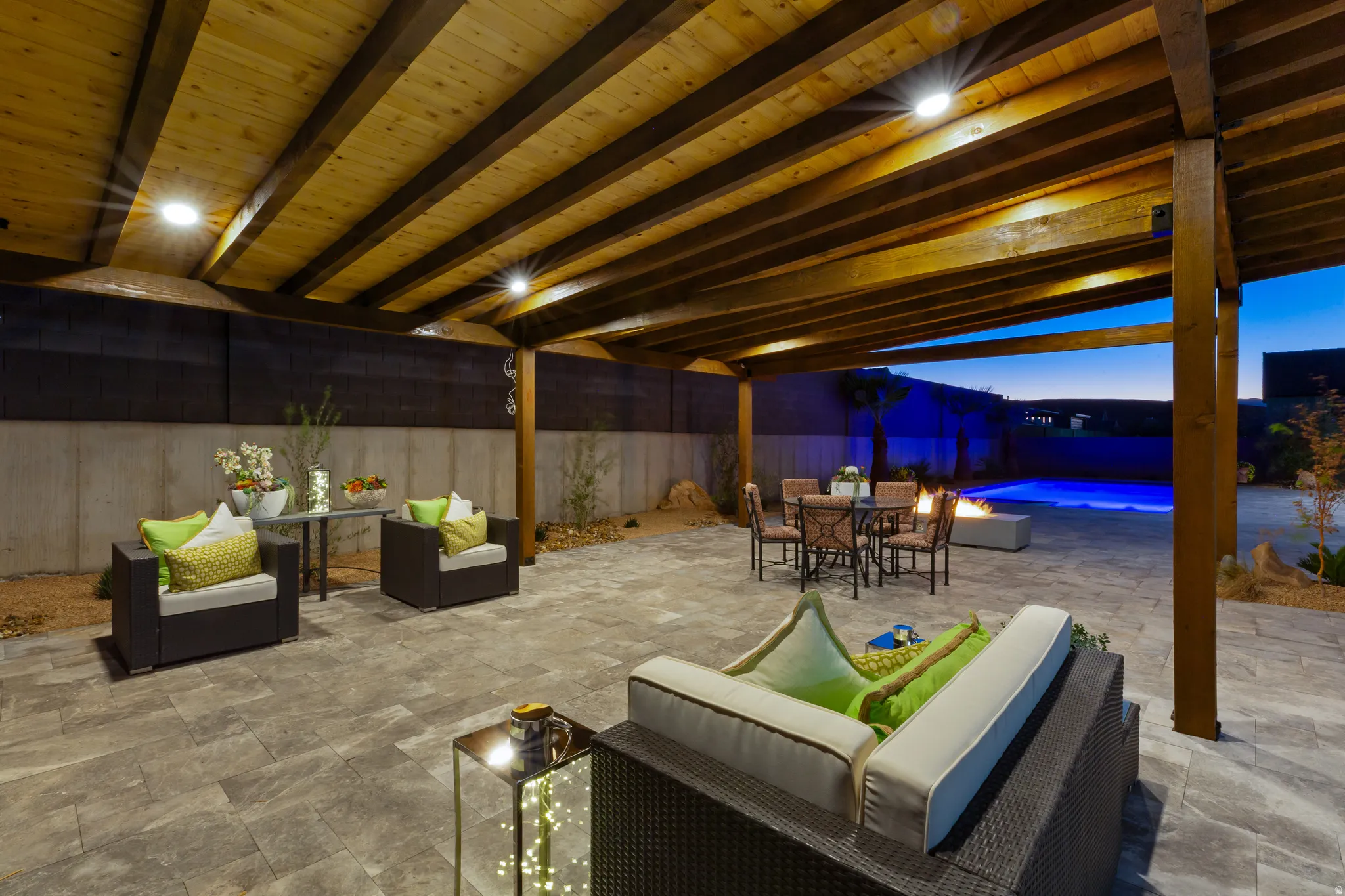 Covered patio with a wood-finish ceiling, recessed lighting, and paver flooring