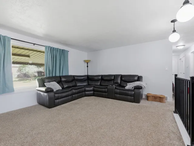 Neutral-toned carpeting throughout