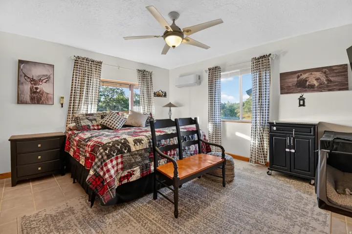Primary Bedroom with ample natural light and large double closet