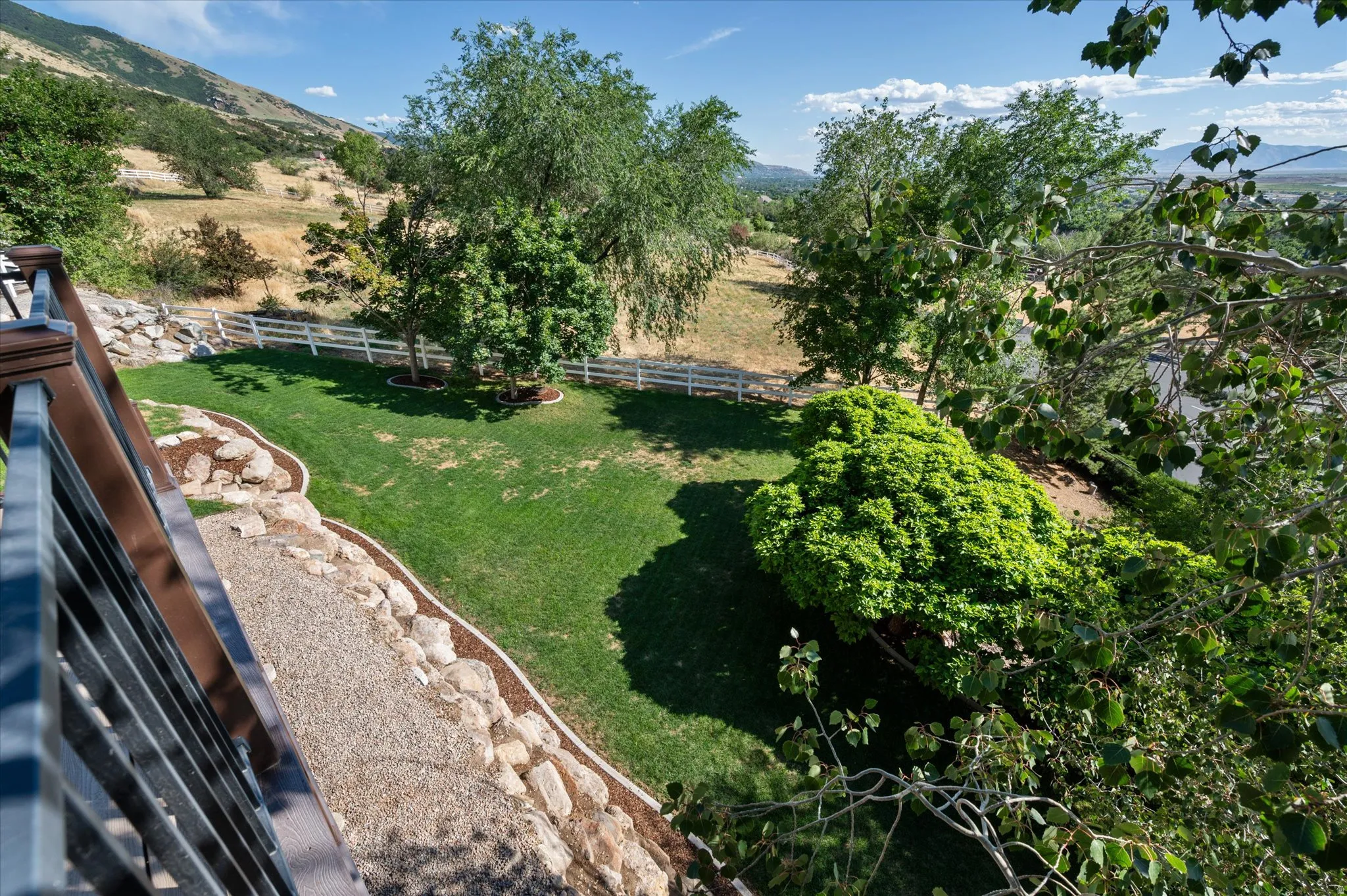View of amazing landscaped yard from upper deck.