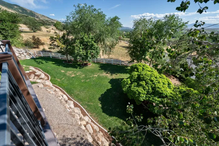 View of amazing landscaped yard from upper deck.