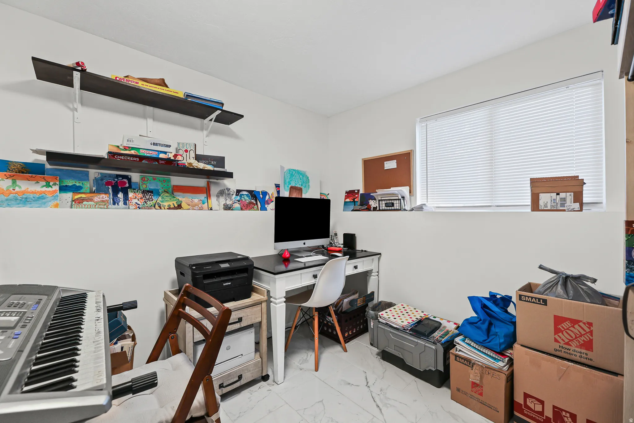 White walls, recessed window, white blinds, and built-in shelving