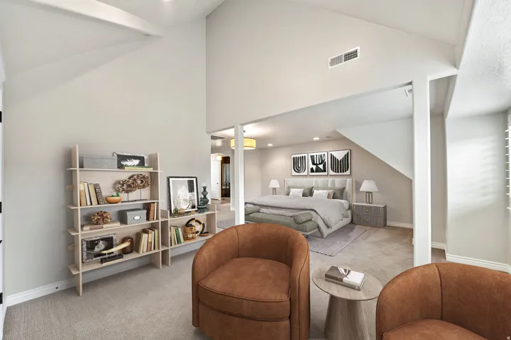 Vaulted ceilings with recessed lighting, carpet flooring, a built-in shelving unit, and a window with blinds
