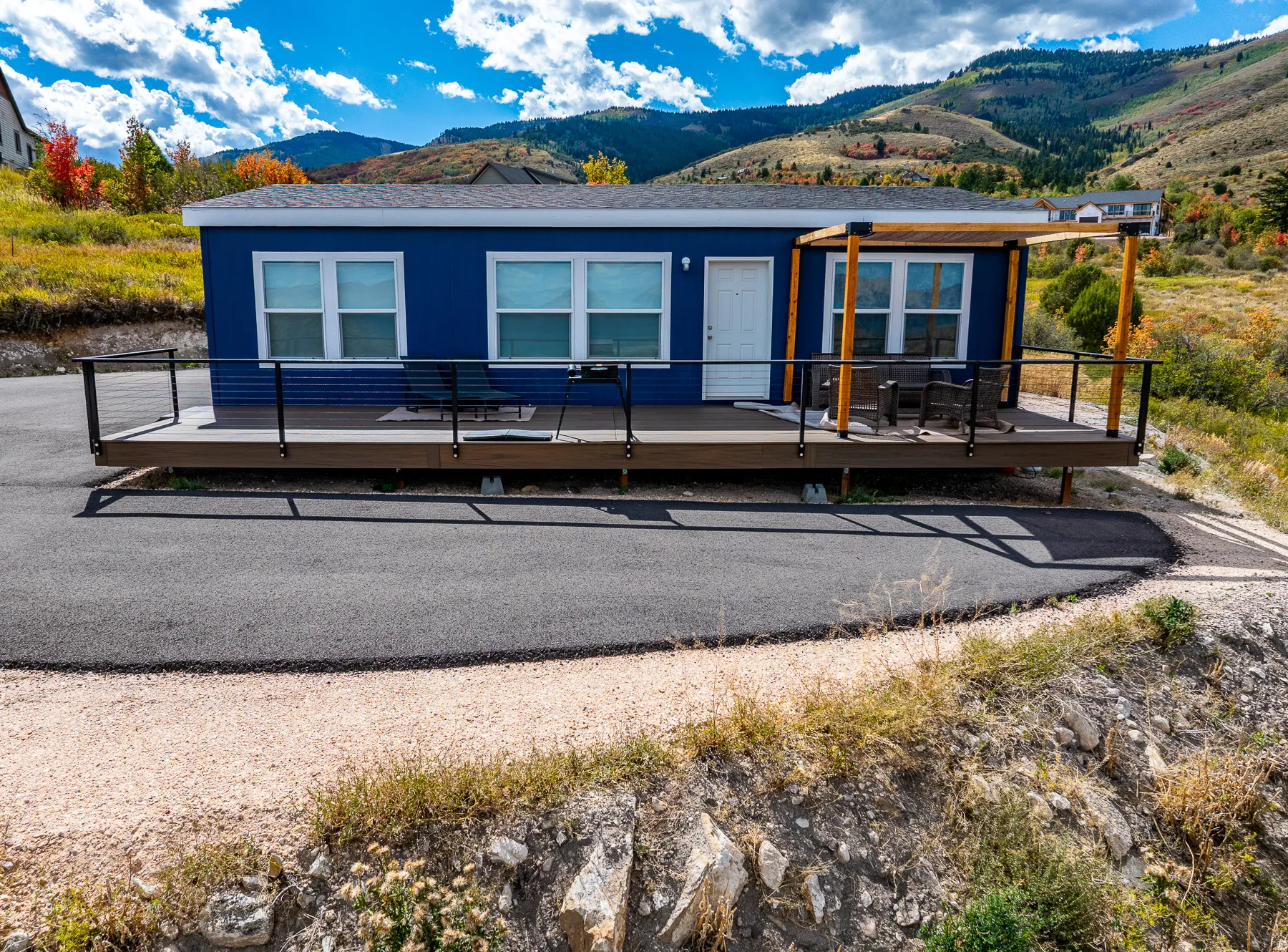 Blue exterior with white window trim