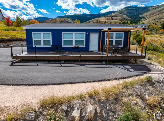 Blue exterior with white window trim