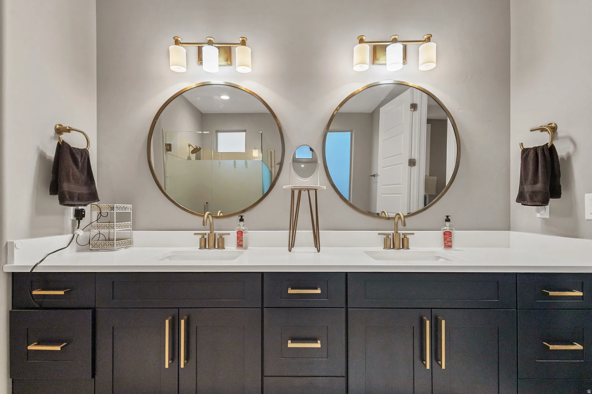 Dual vanities with white countertops