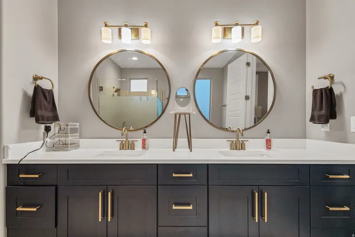 Dual vanities with white countertops