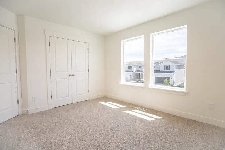Bedroom #2 with large closet and great windows.