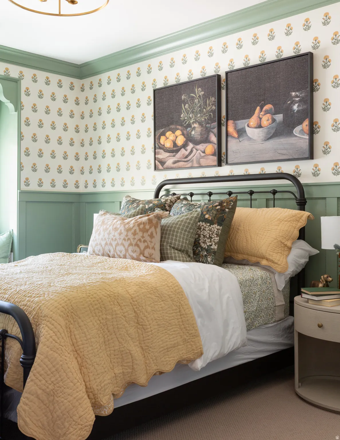 Wallpapered walls with green crown molding and wainscoting