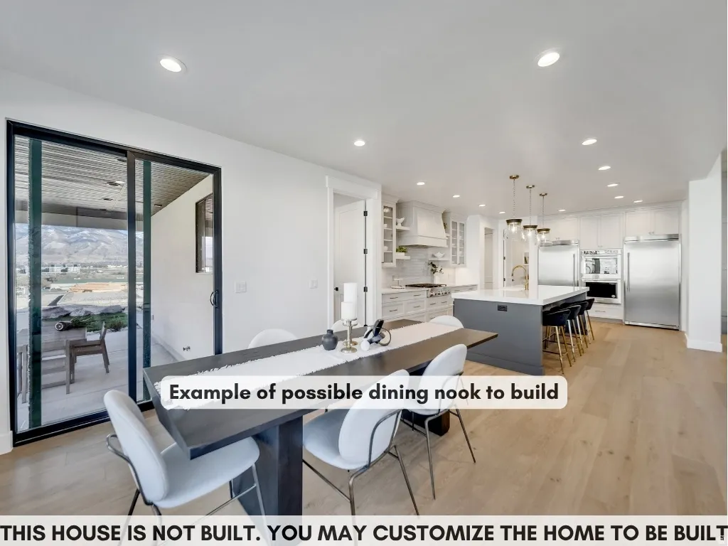 Expansive light wood-finish flooring throughout