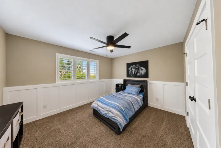 Wall paneling with a rich neutral paint color