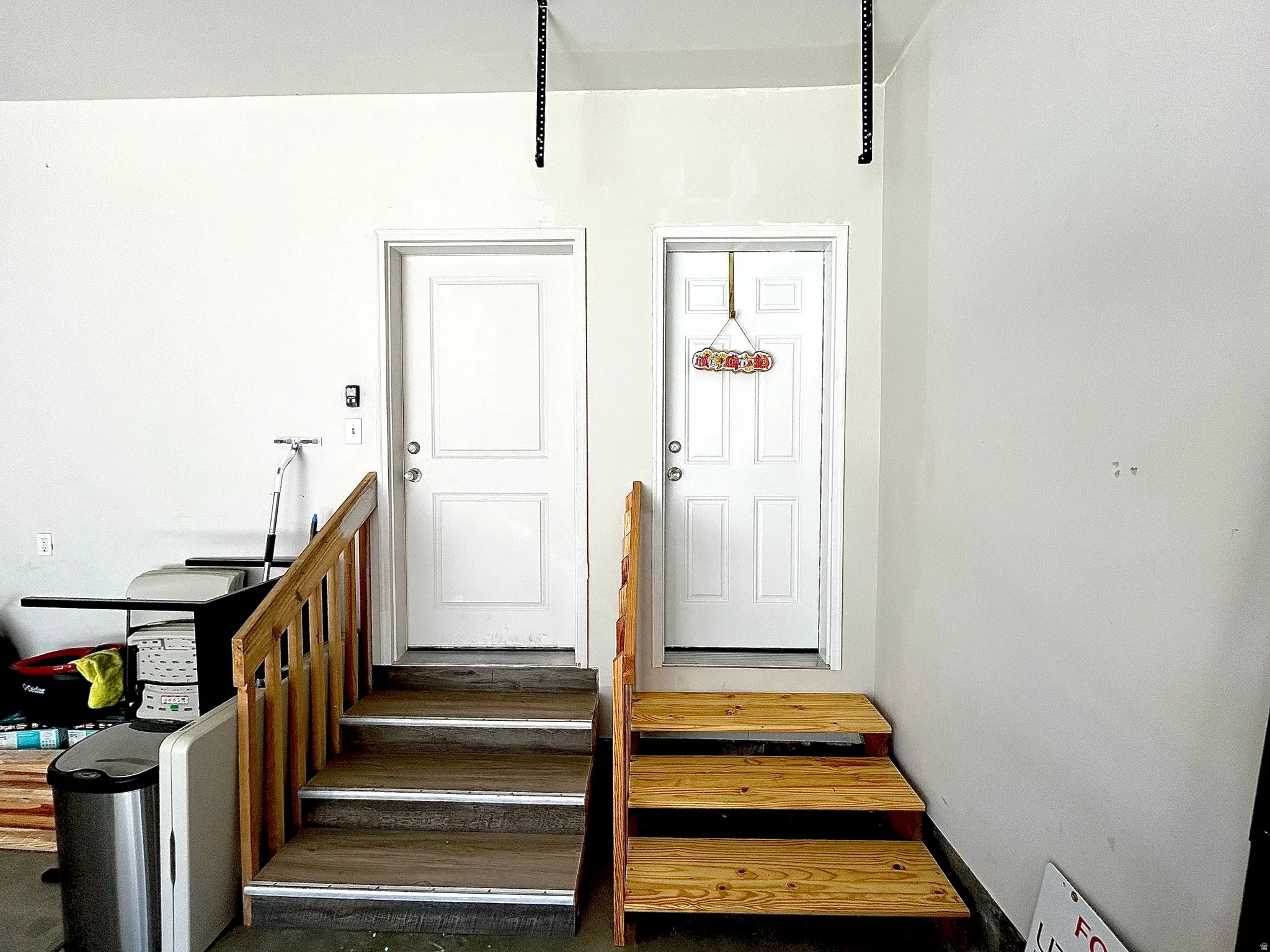 Wood-finish flooring stairs with wood railing