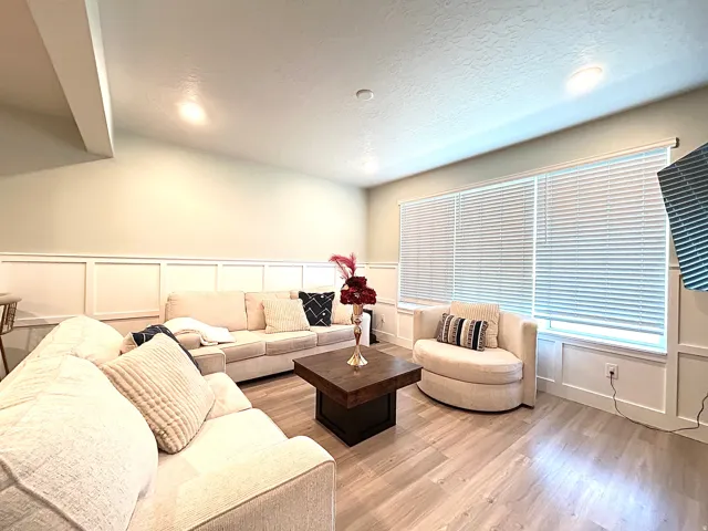 Recessed lighting, wood-finish flooring, and wainscoting