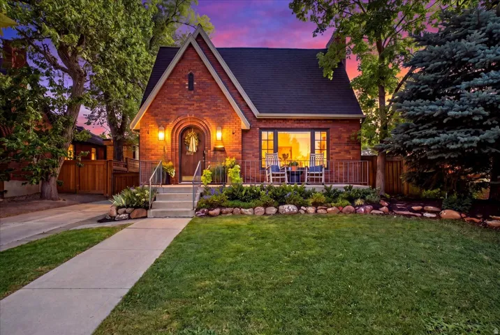 Red brick exterior with an arched entryway