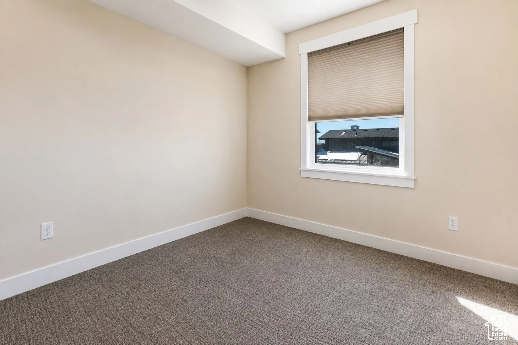 Neutral-toned walls with contrasting white trim