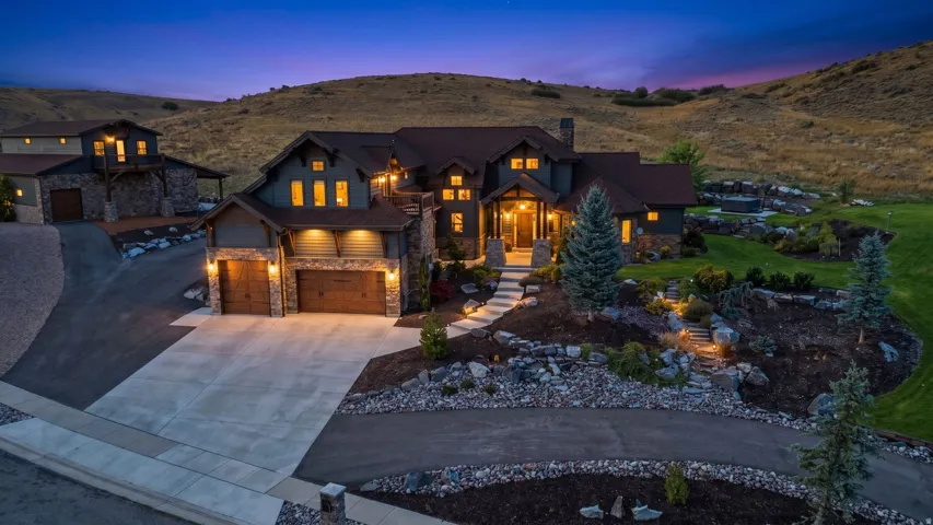 Craftsman-style exterior with stone and siding accents