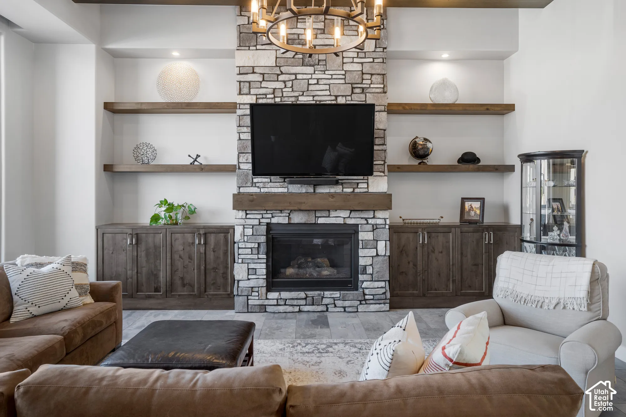 Stone-faced fireplace with a wood mantel