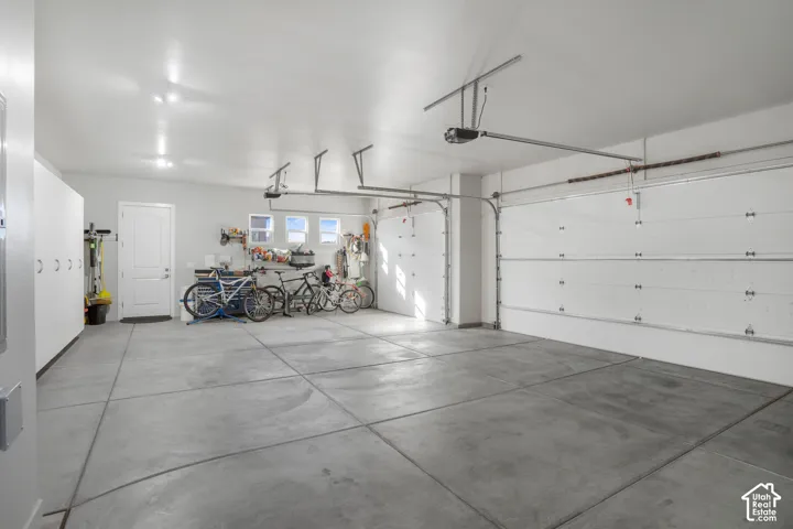 Multiple garage doors with automatic openers