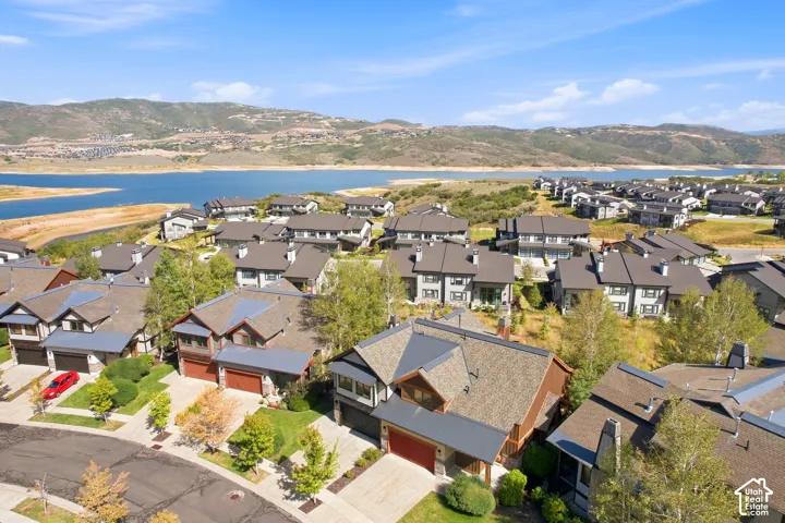 Residential community featuring a large body of water and distant mountains