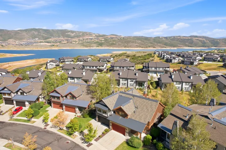 Residential community featuring a large body of water and distant mountains