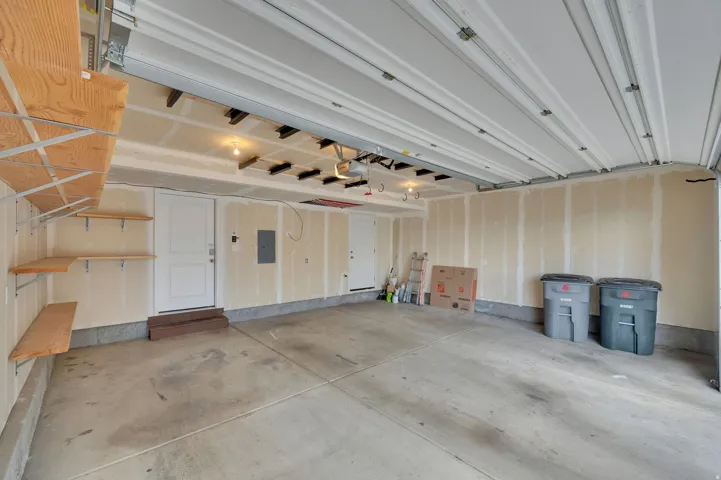 Spacious garage with custom shelfs