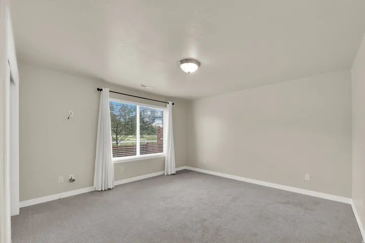 Bedroom on first level off the entryway
