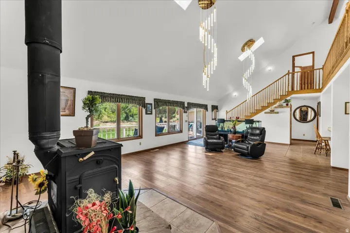Vaulted ceilings with skylights and contemporary chandeliers