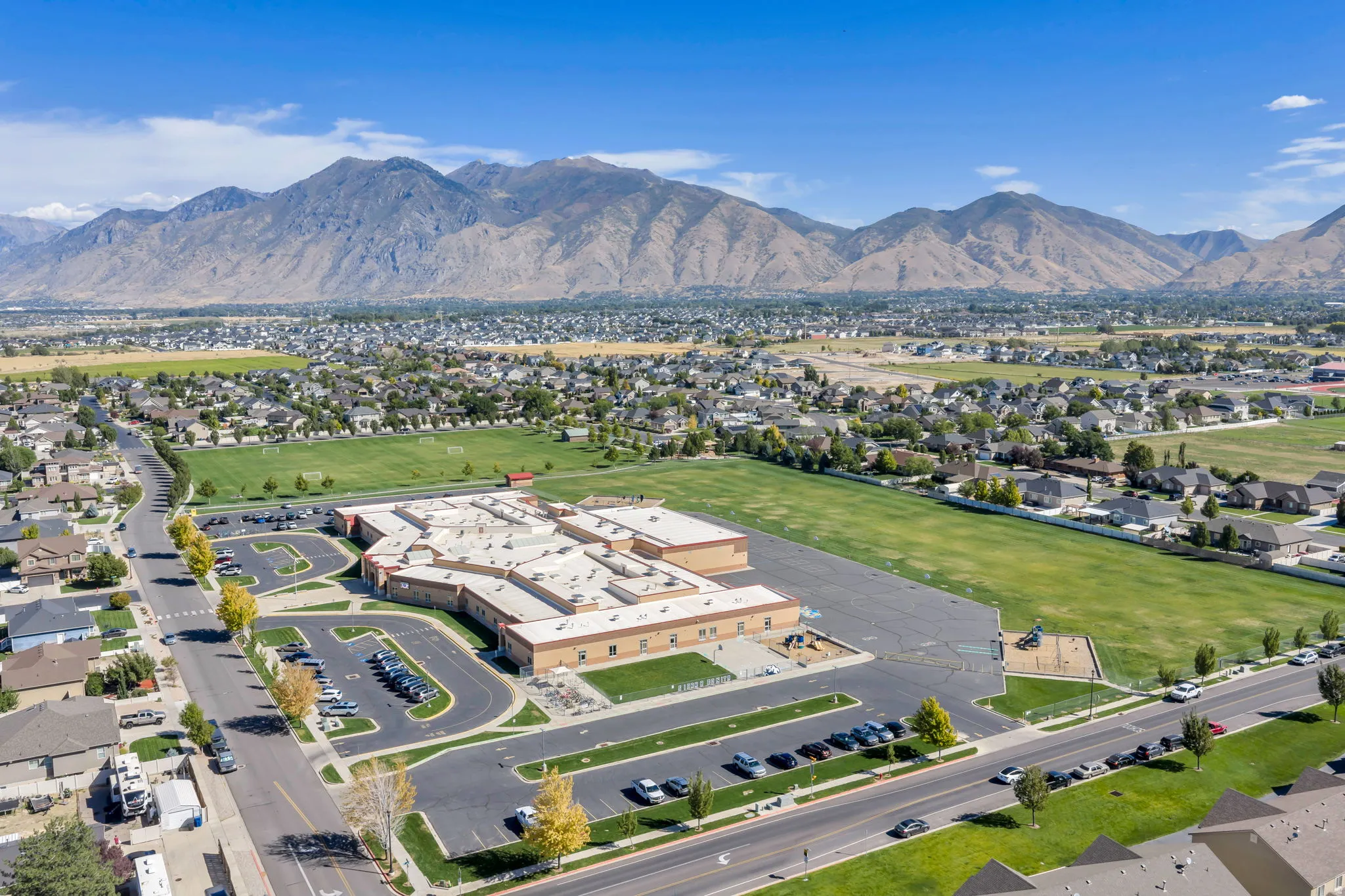 Expansive mountain backdrop with a developed residential area