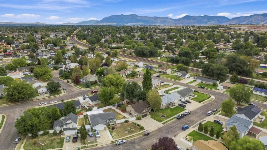 Expansive residential area with a diverse collection of homes, mature tree canopy, and established infrastructure