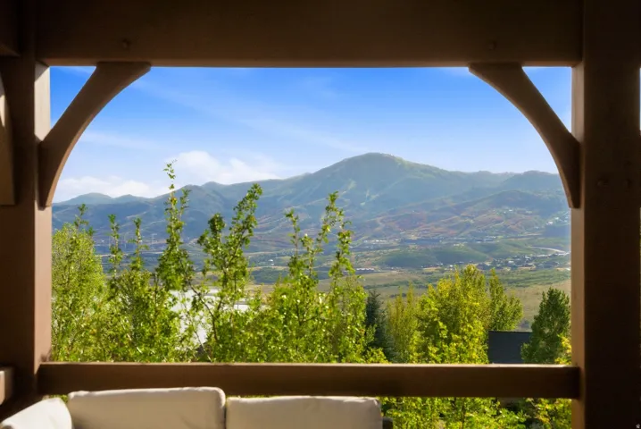 Covered outdoor space featuring robust wood framing