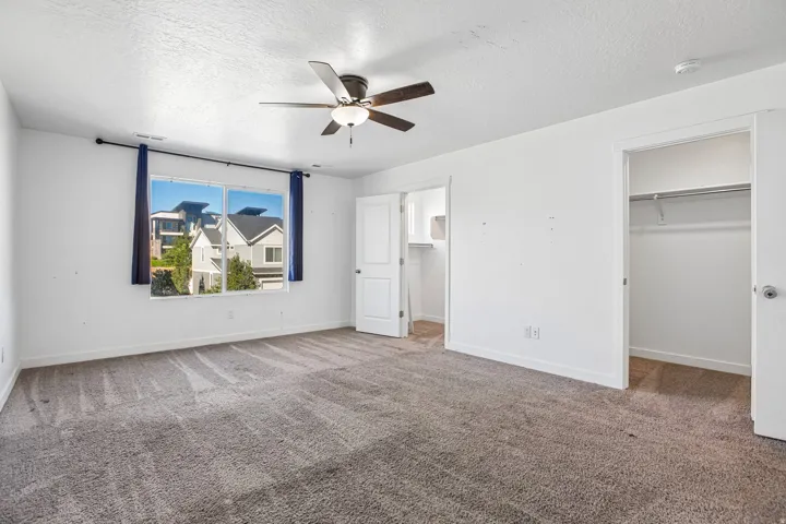 Primary bedroom with double closet and primary suite