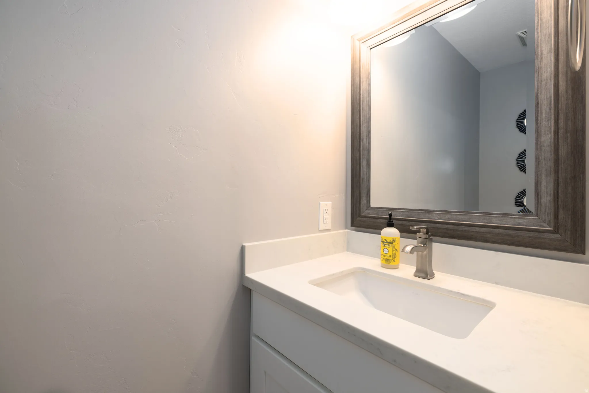 White countertop with an integrated rectangular sink