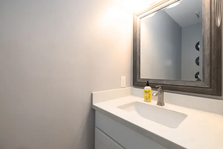 White countertop with an integrated rectangular sink
