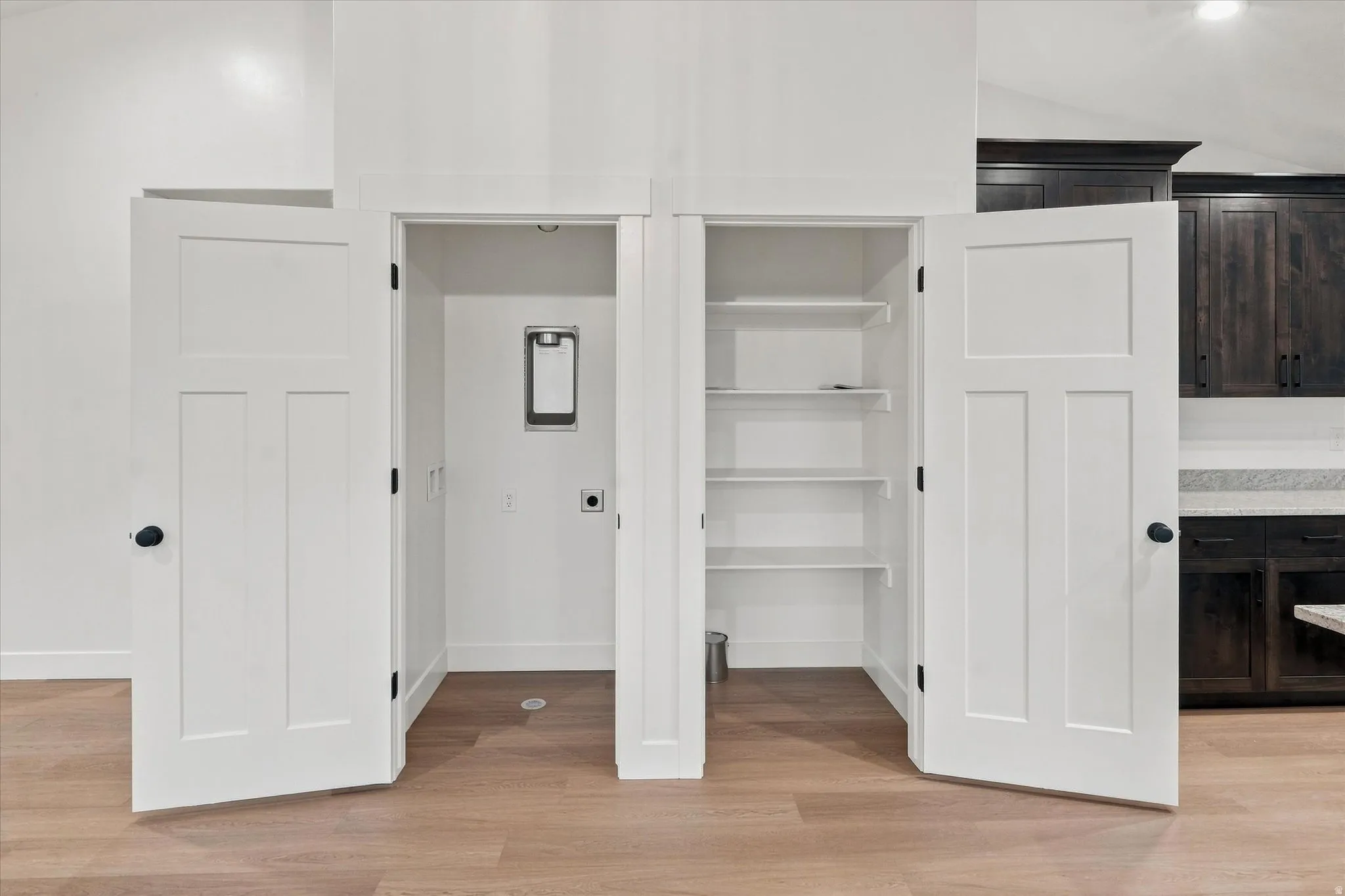 Utility closet with washer/dryer hookups