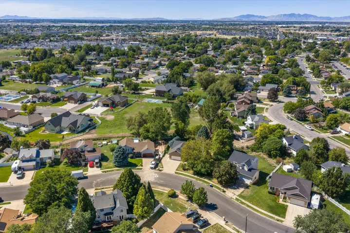 Residential area featuring an abundance of mature trees and established homes