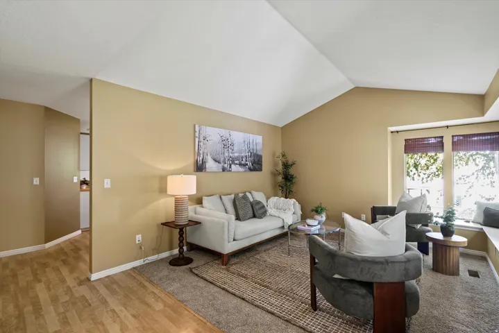 Vaulted ceiling with an integrated window bench and large windows