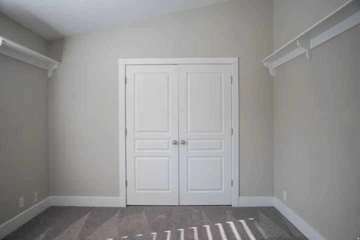 Angled ceiling with neutral wall paint