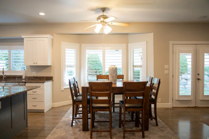 Bay window with plantation shutters and French doors
