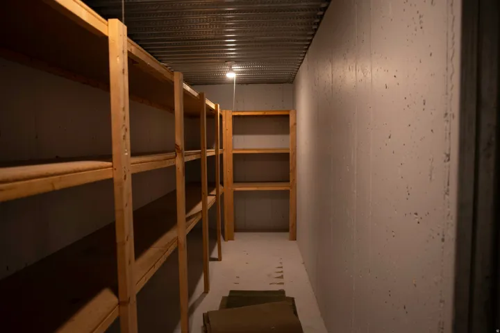 Ample cold storage under suspended porch