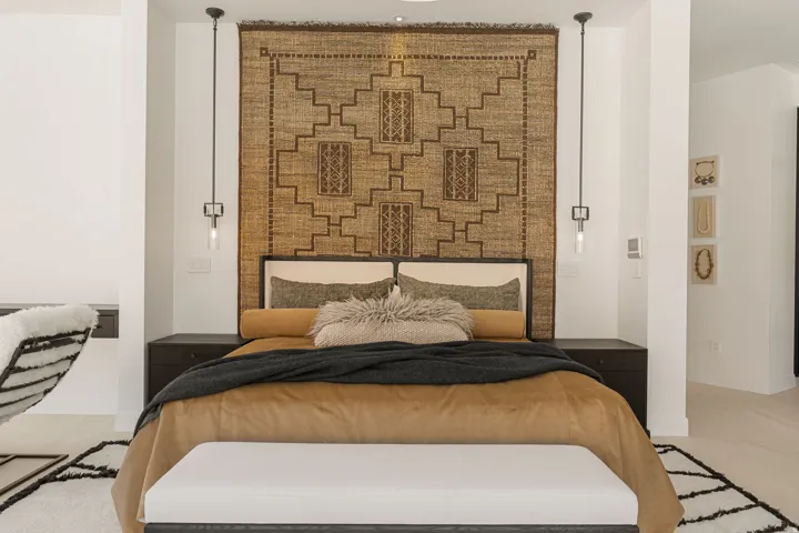 Recessed lighting, light-toned flooring, built-in desk, and ceiling-mounted pendant lights