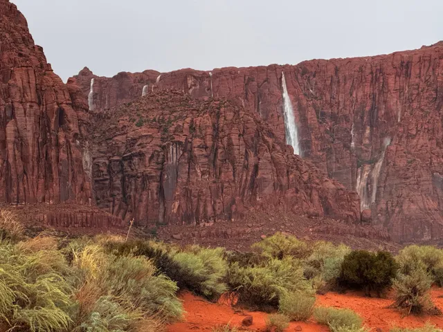 These waterfalls can be seen from three rooms in the home when it rains!