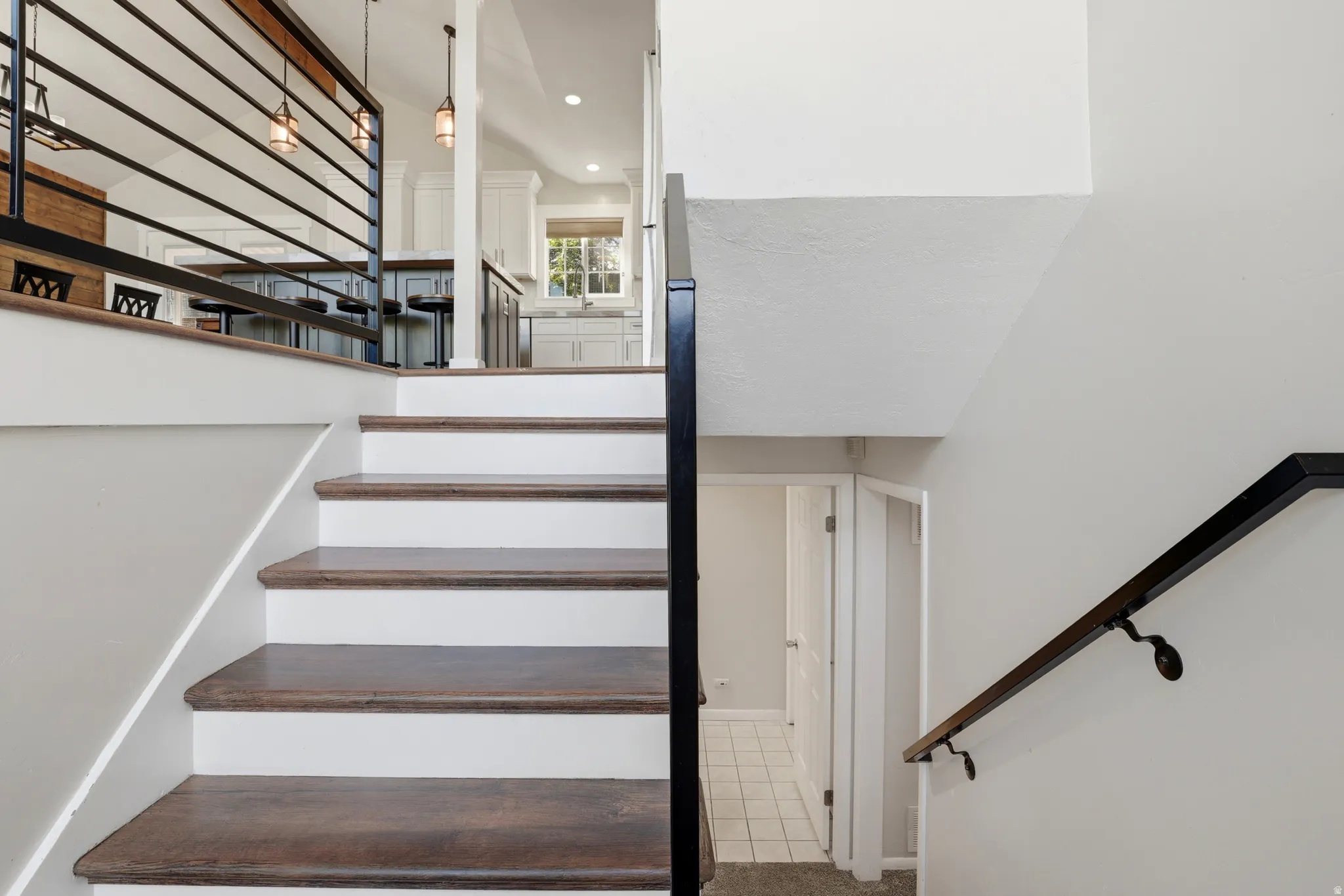 Wood-finish staircase with white risers