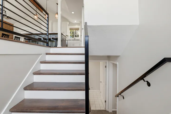Wood-finish staircase with white risers