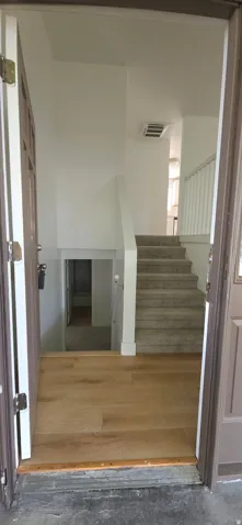 Wood-finish flooring at entry