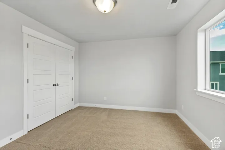 Neutral wall color with white trim