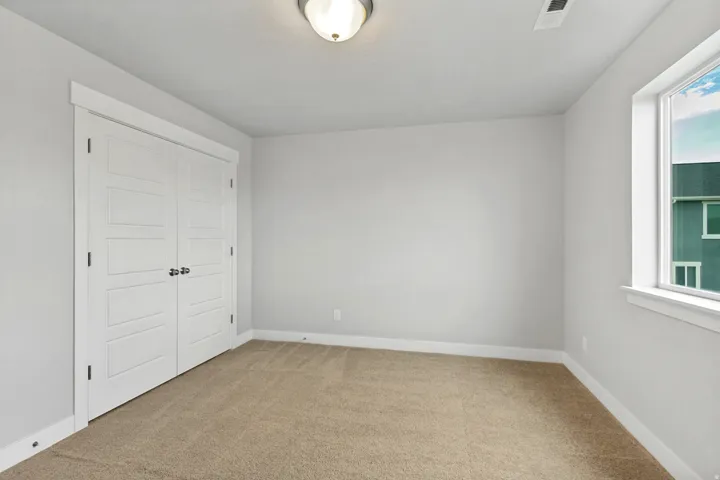 Neutral wall color with white trim