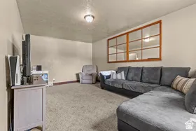 Wall-to-wall carpeting and a ceiling-mounted light fixture